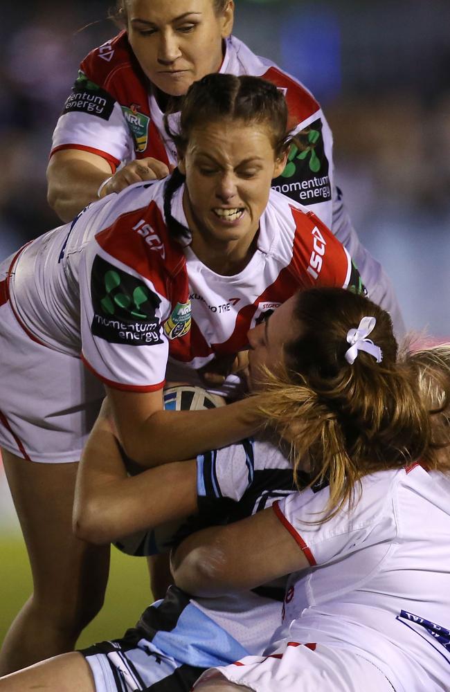 Mia Woods of the Sharks is tackled in Saturday’s match-up.