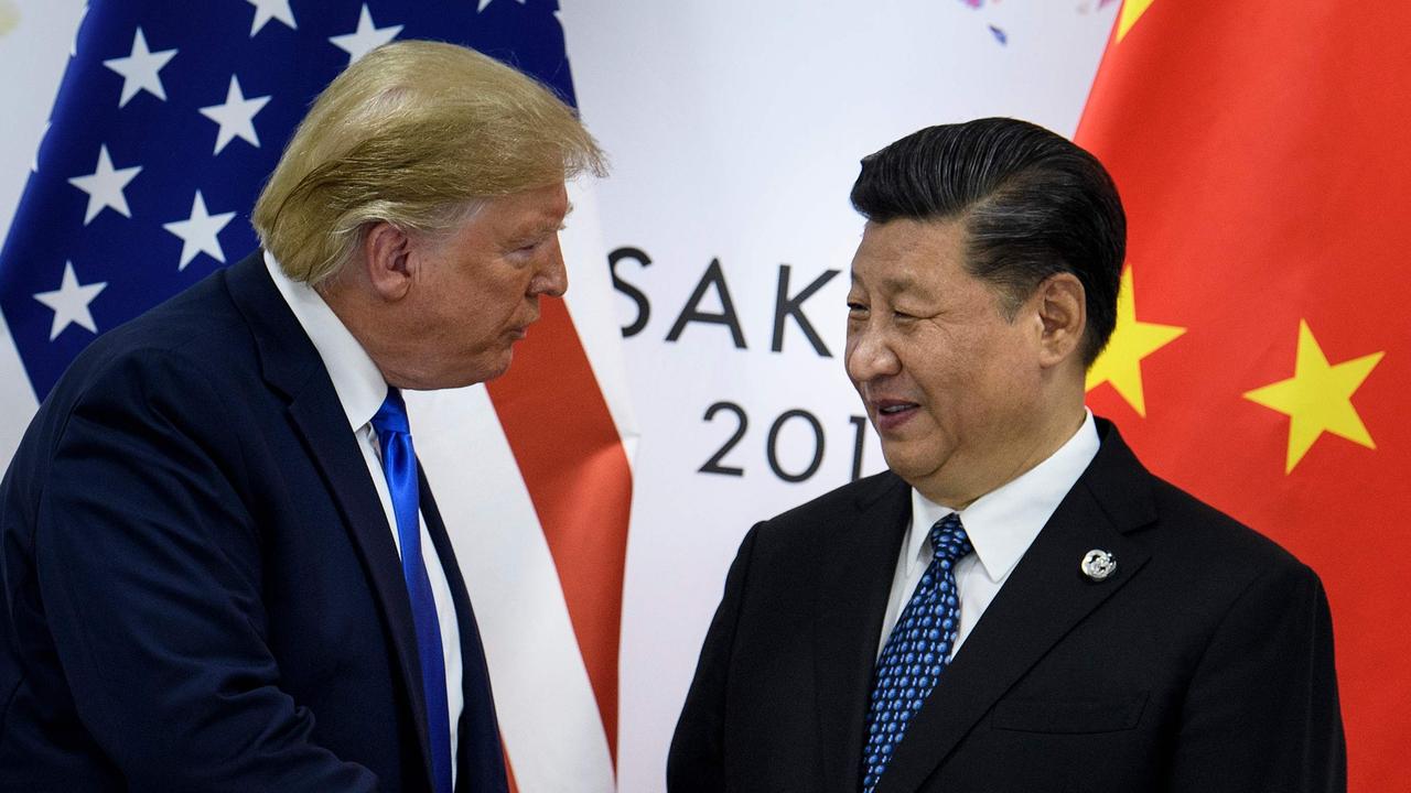 US President Donald Trump meets with China's President Xi Jinping to talk trade relations in June of last year. Picture: Brendan Smialowski / AFP