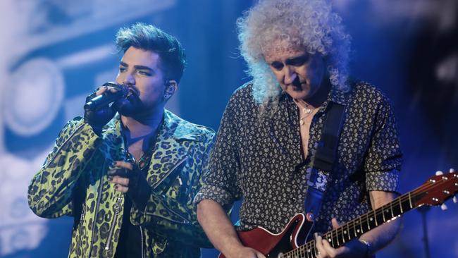 SYDNEY, AUSTRALIA - FEBRUARY 16: Adam Lambert (L) performs with Brian May of Queen during Fire Fight Australia at ANZ Stadium on February 16, 2020 in Sydney, Australia. (Photo by Cole Bennetts/Getty Images)