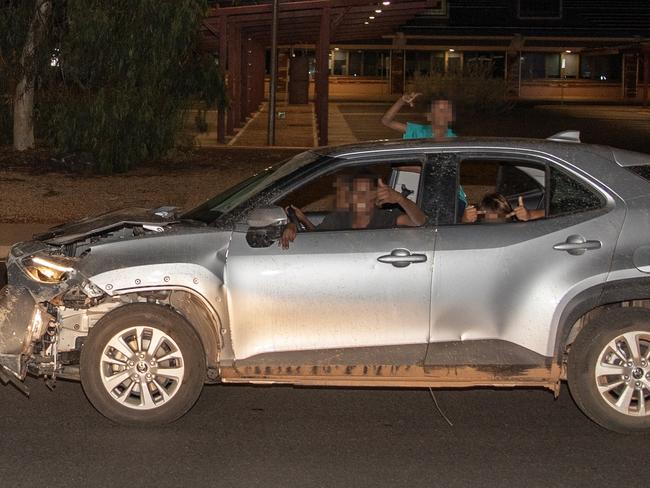 Children of Alice Springs, aged 10, 11 and 13 take a stolen Toyota for a joyride in the streets. Picture: Liam Mendes