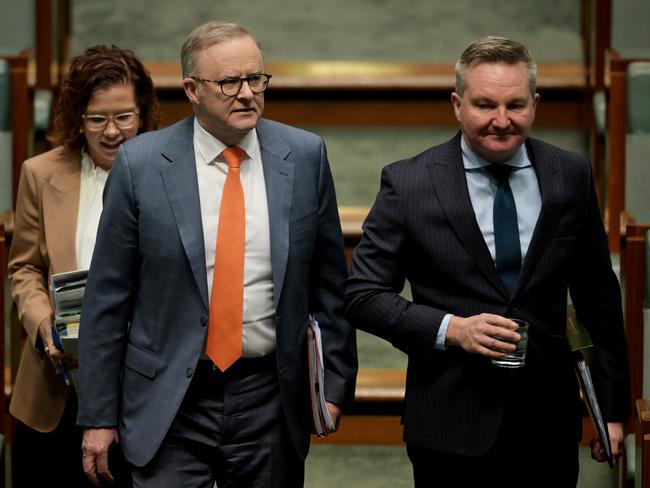 CANBERRA, AUSTRALIA - AUGUST 22: Prime Minister Anthony Albanese with Minister for Climate Change and Energy of Australia Chris Bowen (R) during Question Time in the House of Representatives at Australian Parliament House on August 22, 2024 in Canberra, Australia. Pressure is building on the Albanese government on a number of fronts, but cost of living pressures are top among them and may prove to be a damaging political liability in the months ahead as Peter Dutton gets the opposition ready for next year's election season. (Photo by Tracey Nearmy/Getty Images)