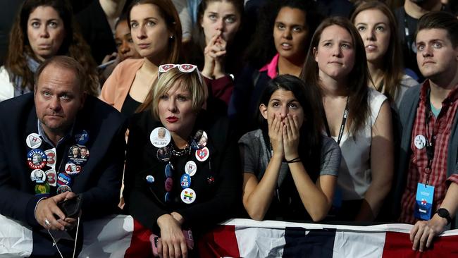 Grim faces at the Clinton event, prior to Mr Trump’s victory in the polls. Picture: Getty Images