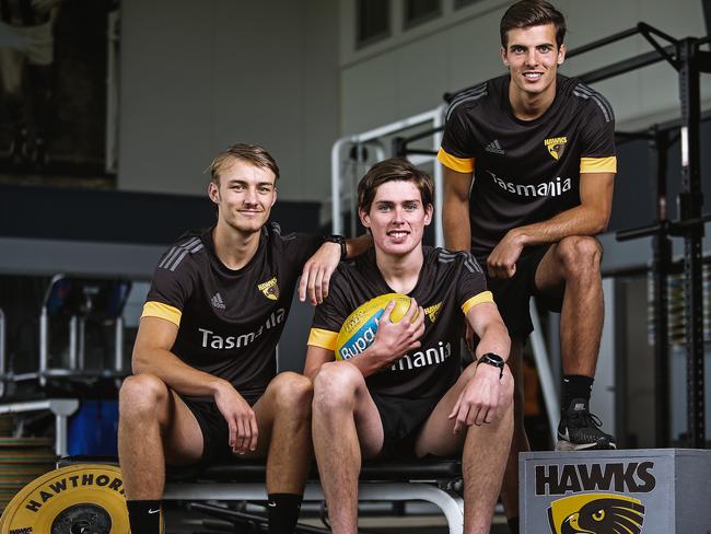 Will Day (centre) with Josh Morris and Finn Maginness of the Hawks at Waverley Park. Picture: Martin Keep/Getty Images