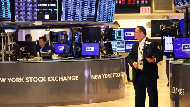 Traders work the floor of the New York Stock Exchange during morning trading. Picture: Michael M. Santiago/Getty Images/AFP