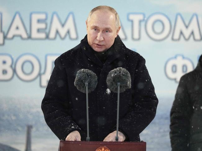 Russia's President Vladimir Putin attends a flag-rising ceremony at the new Imperor Alexander III and Krasnoyarsk nuclear submarines at Sevmash shipyard in the Arctic port of Severodvinsk. Picture: AFP
