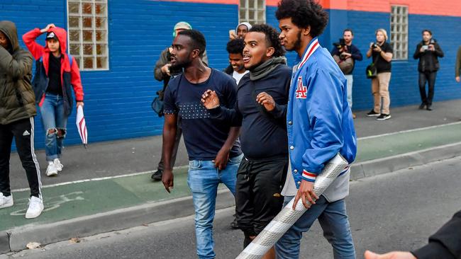 Protesters taunted police at the controversial right-wing figure’s event. Picture: Jake Nowakowski