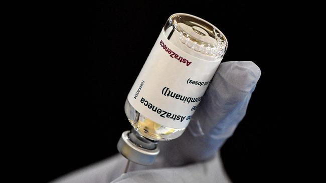 A health worker prepares a dose of AstraZeneca vaccine in Smithfield in Sydney’s southwest on Wednesday. Picture: AFP