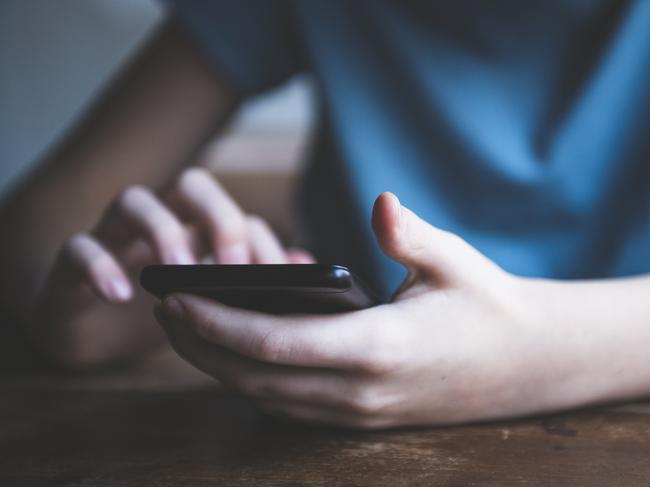 Boy using phone Picture: iStock