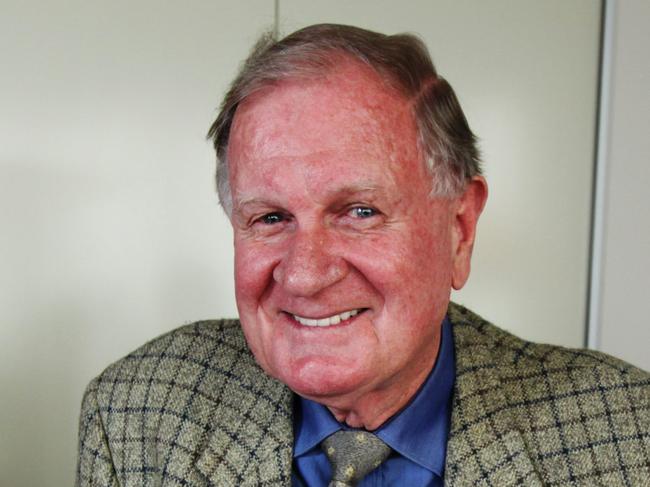 Former News Limited executive Ken Cowley, now RM Williams chairman, who was instumential in starting their national newspaper The Australian, with a copy of the first edition of the newspaper and the first ever online edition on new Apple iPad application to be launched tomorrow, in his office in Sydney.