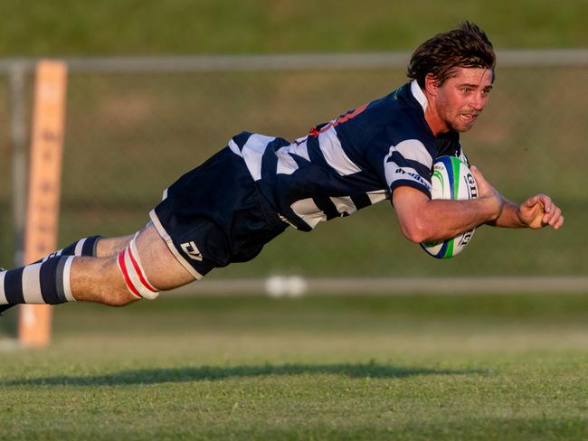 Martin Strachan brought plenty in defence for the Cougars against the Darwin Dragons. Picture: Che Chorley