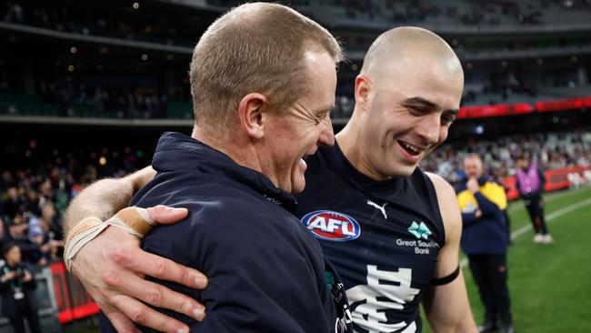 Alex Cincotta, pictured with coach Michael Voss, will miss the start of the 2025 season. Picture: Getty Images)