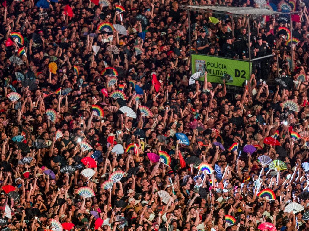 Military Police officers stand on an elevated platform as fans wait for the beginning of the free mega-concert of US pop star Lady Gaga at Copacabana beach in Rio de Janeiro. Picture: AFP