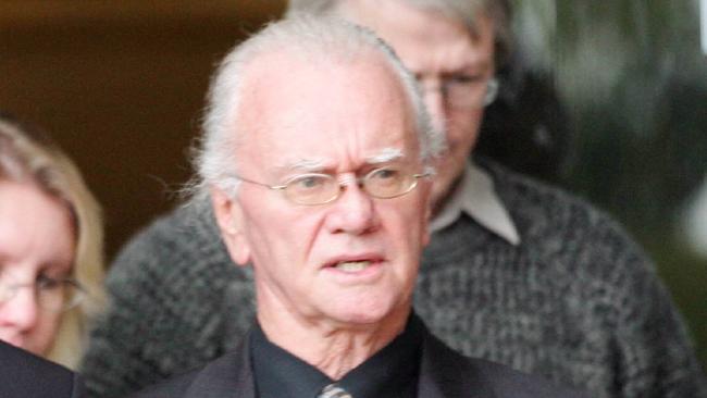Colin Greatorix leaves Southport Courthouse with a client. Picture: Gold Coast Bulletin.
