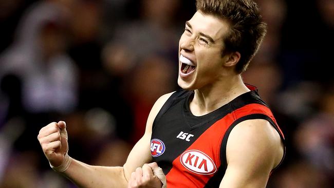 Zach Merrett of the Bombers celebrates a goal.