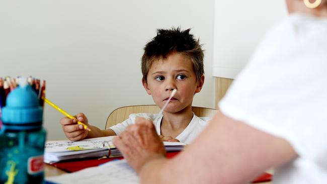 Cooper Green, 6, has a series of tests to make sure he is well enough to take part in the allergy tests by research nurse Helen Czech. Pictures Tim Carrafa