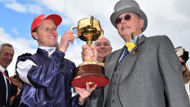 Jockey Kerrin McEvoy and Lloyd Williams at Flemington following Almandin’s victory.