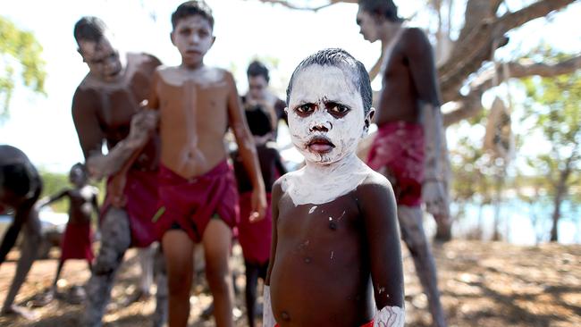 People from the Rirratjingu tribe in Yirrkala, East Arnhem Land, prepare themselves for a welcome to country. Pictures: Jack Tran