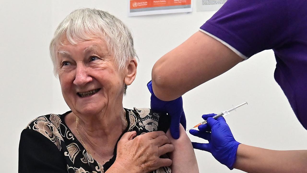 Jane Malysiak, 84, became the first person in Australia to receive a dose of the Pfizer/BioNTech COVID-19 vaccine on Sunday. Picture: Steven Saphore/AFP