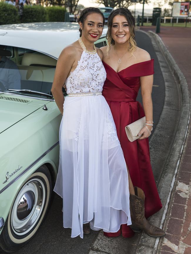 Leigh Melville (left) and Chloe Mitchell at Centenary Heights State High School formal at Picnic Point, Friday, November 20, 2020. Picture: Kevin Farmer