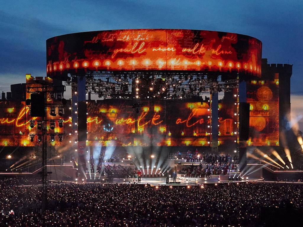 Crowds watch Bryn Terfel and Andrea Bocelli singing You'll Never Walk Alone on the incredible stage. Picture: AFP