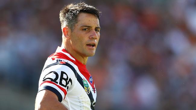 Cooper Cronk of the Roosters watches on during the round one NRL match between the Wests Tigers and the Sydney Roosters at ANZ Stadium on March 10, 2018 in Sydney, Australia. (Photo by Mark Kolbe/Getty Images)