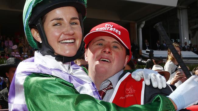 2015 Melbourne Cup day at Flemington Racecourse, Race7- Melbourne Cup, Michelle Payne with brother Stevie after winning the Melbourne Cup on Prince Of Penzance. Melbourne. 3rd November 2015. Picture: Colleen Petch. MelbourneCup15