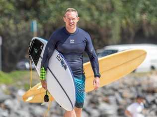 FROTHING: Mick De Brenni having an early surf at Dbah. Picture: Surfing Qld