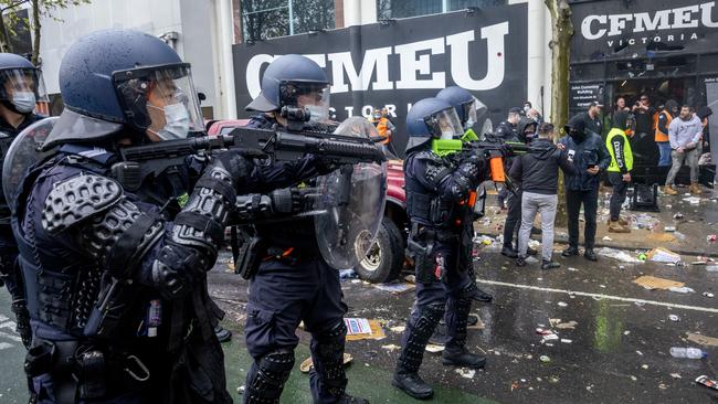 Victorian police try to restore peace outside the CFMEU headquarters in Melbourne’s CBD. Picture: David Geraghty