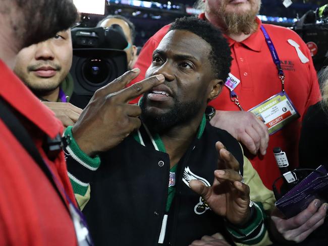 Kevin Hart attempts to get onto the stage following the Eagles 41-33 win over the New England Patriots in Super Bowl LII. Picture: Getty Images