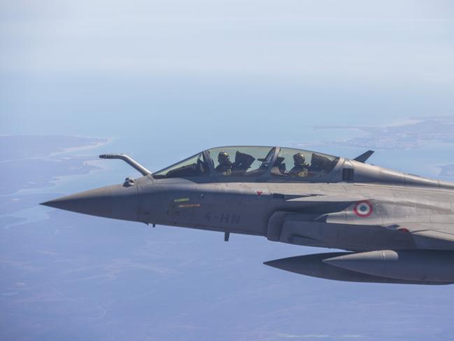 A French Rafale jet refuels mid-air about 100km south of Darwin. Picture: Floss Adams.