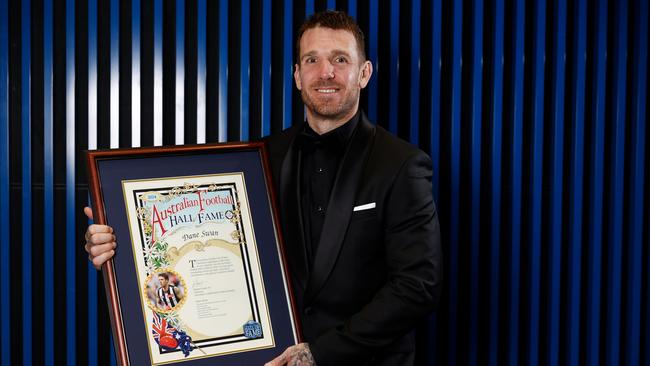 Dane Swan with his AFL of Fame certificate prior to his hilarious performance on stage. (Photo by Michael Willson/AFL Photos via Getty Images)