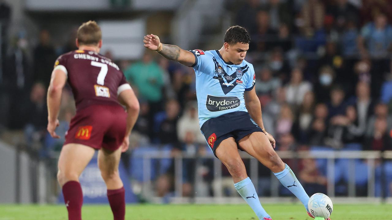 Latrell Mitchell kicks for goal in Origin. Pic Peter Wallis.