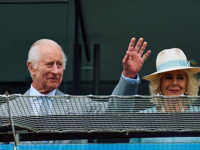 King Charles and Queen Camilla enjoy the Epsom races. Picture: AFP