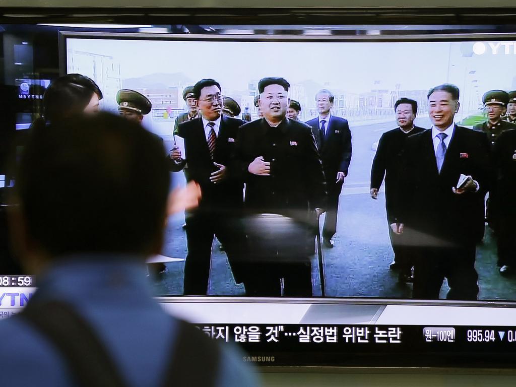 2014: A man watches a TV news program at the Seoul Railway Station im South Korea, showing North Korean leader Kim Jong-un using a cane, reportedly during his first public appearance in five weeks in Pyongyang, North Korea. Picture: Lee Jin-man