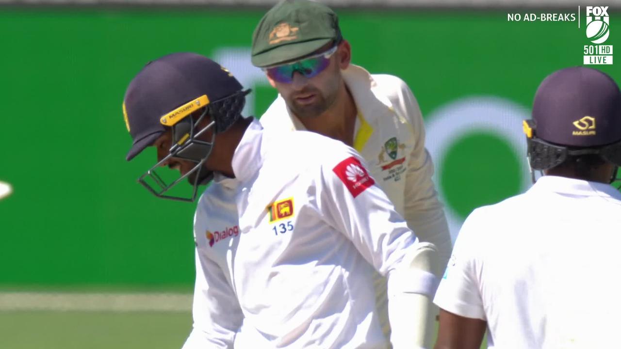 Nathan Lyon chirps to Dhananjaya de Silva on day three of the second Test. 