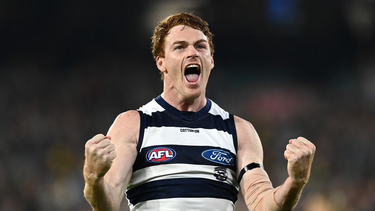 Gary Rohan celebrates in front of fans at the MCG. Picture: Getty Images