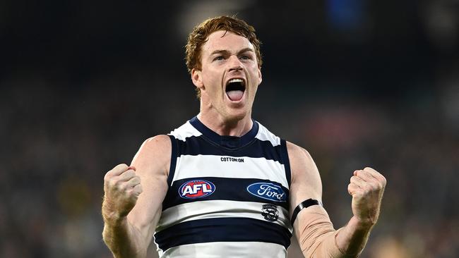 Gary Rohan celebrates in front of fans at the MCG. Picture: Getty Images