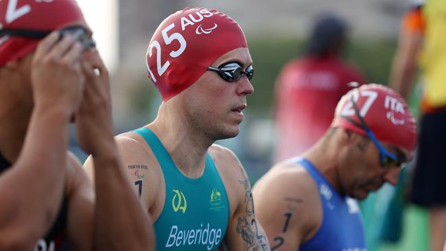 TOKYO, JAPAN – AUGUST 29: Nic Beveridge of Team Australia prepares for the swim start of the men's PTWC Triathlon on day 5 of the Tokyo 2020 Paralympic Games at Odaiba Marine Park on August 29, 2021 in Tokyo, Japan. Picture: Alex Pantling/Getty Images