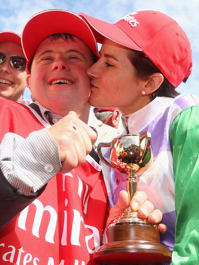 Payne kisses brother and strapper Stephen after the big win. Picture: Quinn Rooney