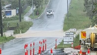 Flash flooding cuts a road at Ripley after heavy rain on Saturday afternoon.