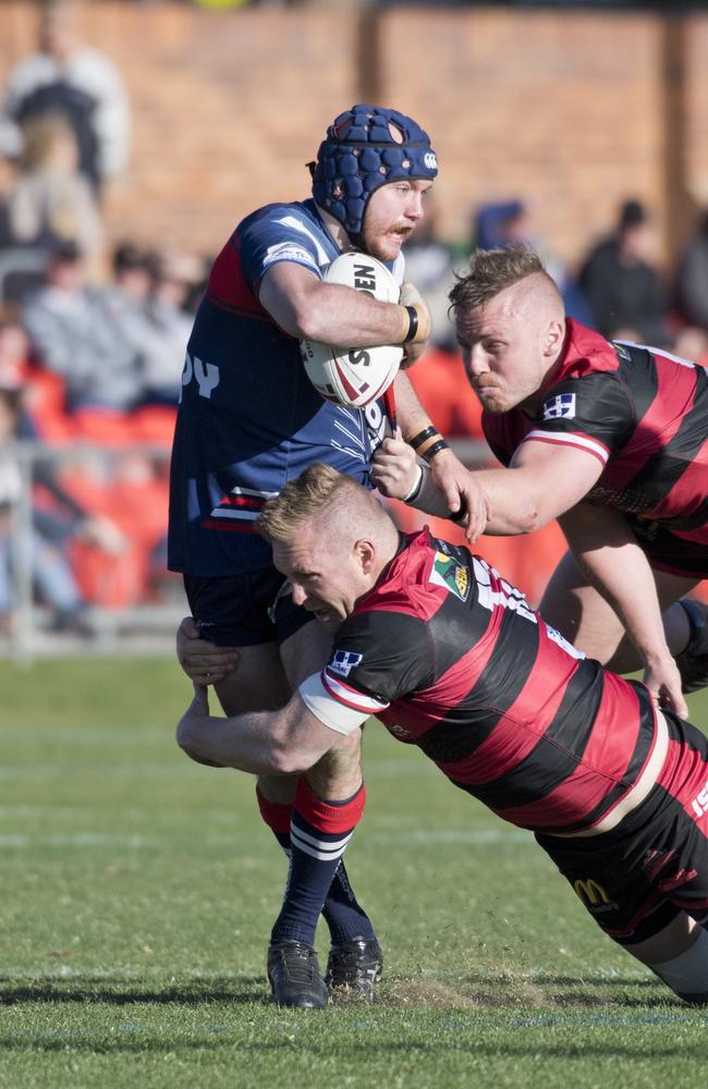 Harry Sullivan, Warwick tackled by Mitch Sargent and Nathan Bowering, Valleys. TRL grand final, Valleys vs Warwick Cowboys. Sunday, 8th Sep, 2019.