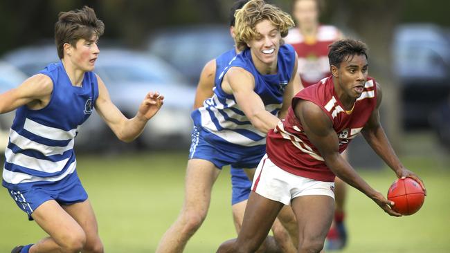 Kysaiah Pickett breaks away playing for Prince Alfred College in 2019. Picture: Dean Martin/AAP