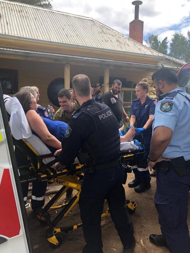 Sarah Tyrrell is loaded into an ambulance. Picture: ADF