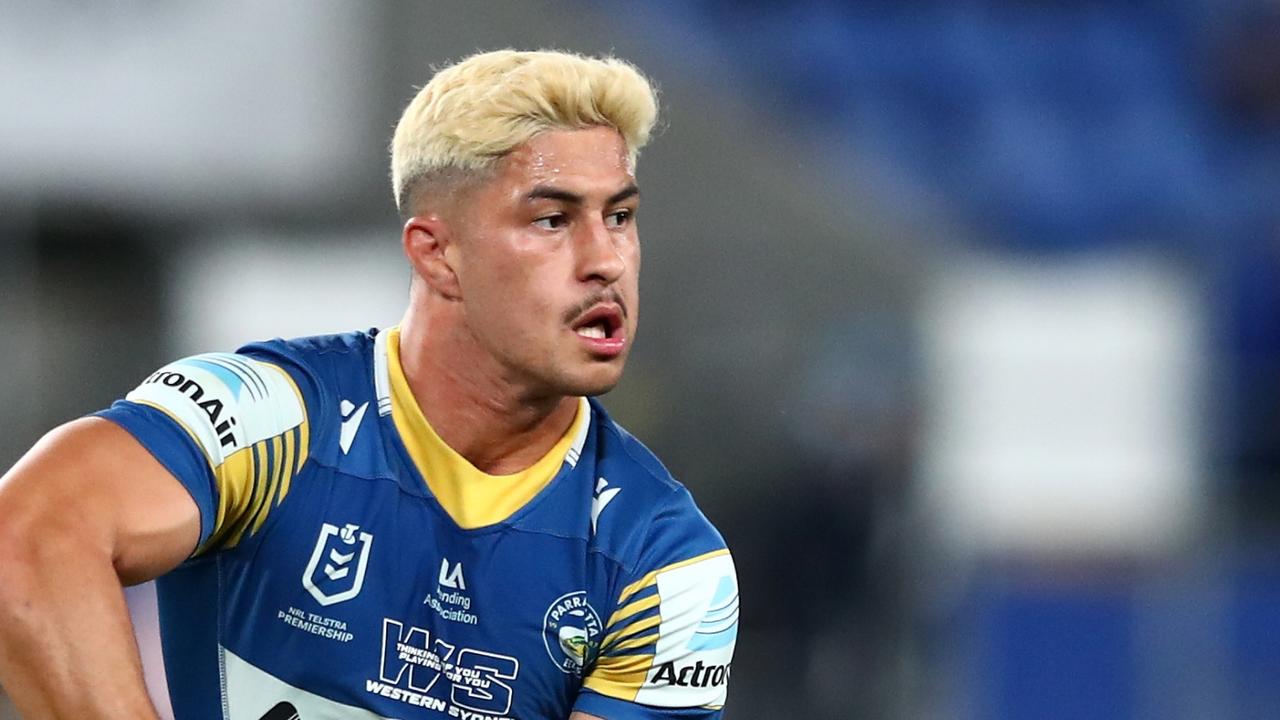 GOLD COAST, AUSTRALIA - AUGUST 21: Dylan Brown of the Eels passes the ball during the round 23 NRL match between the Parramatta Eels and the North Queensland Cowboys at Cbus Super Stadium, on August 21, 2021, in Gold Coast, Australia. (Photo by Chris Hyde/Getty Images)