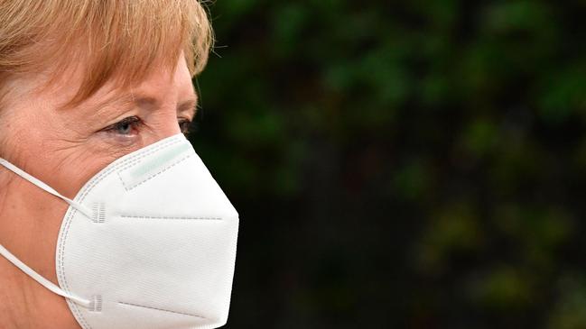 German Chancellor Angela Merkel tries to survive catching a more severe strain of COVID-19. Picture: John Thys/AFP