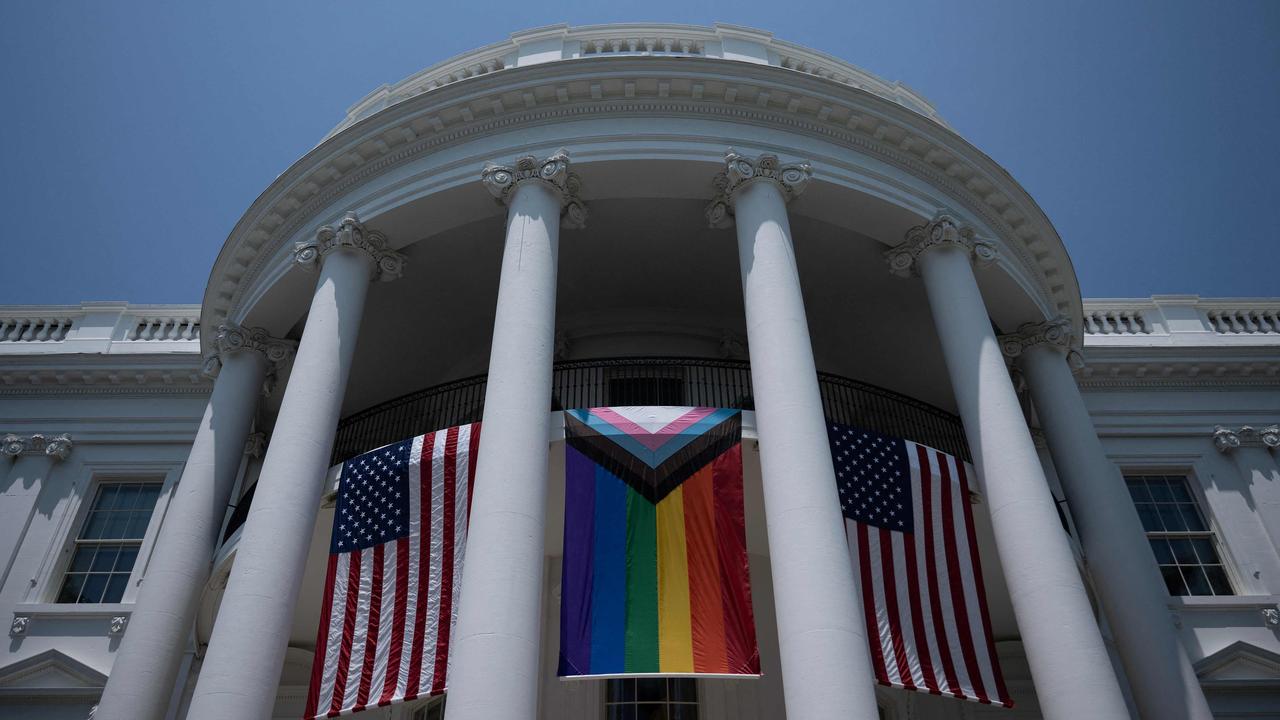 A Pride flag is displayed during a Pride celebration on the South Lawn of the White House in Washington, DC, on June 10, 2023. The White House is ignoring Pride completely in 2025. (Photo by Brendan Smialowski / AFP)