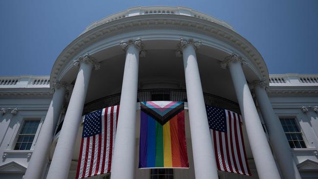 A Pride flag is displayed during a Pride celebration on the South Lawn of the White House in Washington, DC, on June 10, 2023. The White House is ignoring Pride completely in 2025. (Photo by Brendan Smialowski / AFP)