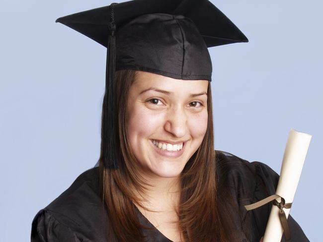 Thinkstock. Woman wearing graduation hat and gown. Graduate. Generic image.