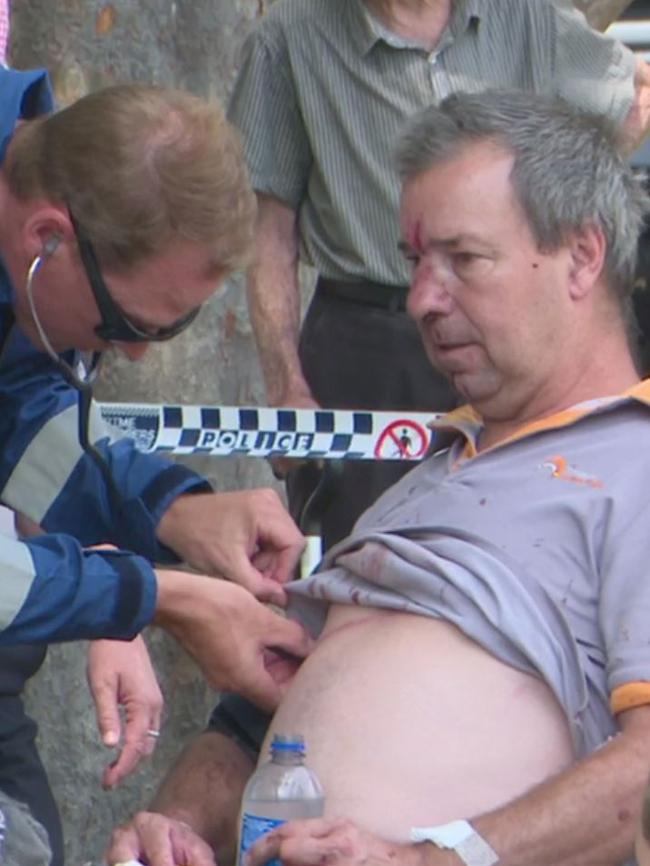 A rail worker is treated at scene. Picture: TNV