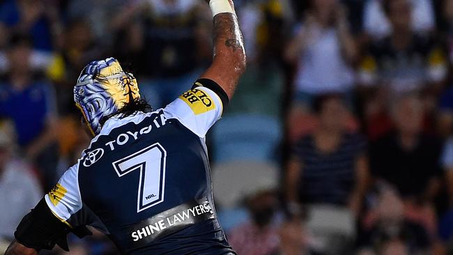 Johnathan Thurston celebrates his winning field-goal.